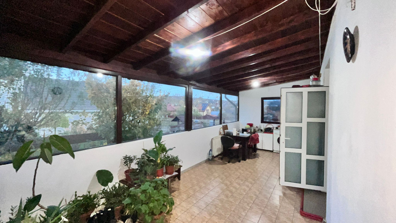 Apartament in vila, pe 2 nivele, cu teren, in Bucium!