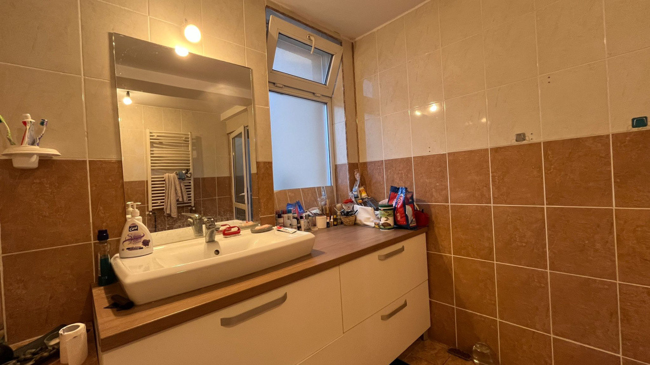 Apartament in vila, pe 2 nivele, cu teren, in Bucium!