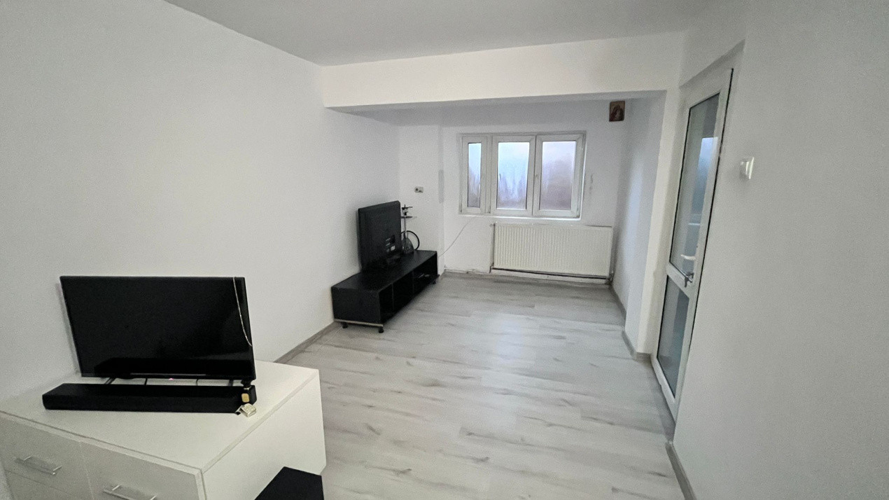 Apartament in vila, pe 2 nivele, cu teren, in Bucium!