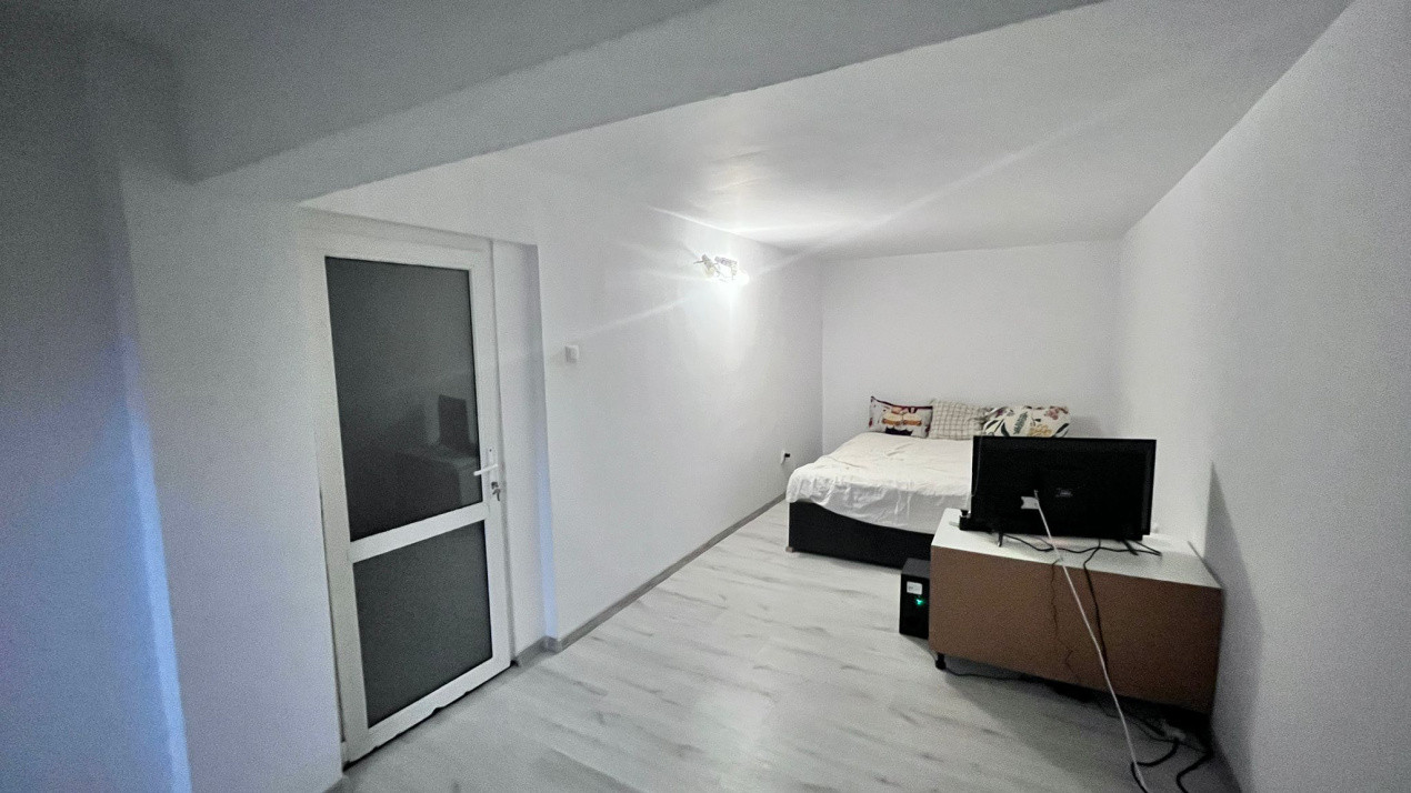 Apartament in vila, pe 2 nivele, cu teren, in Bucium!
