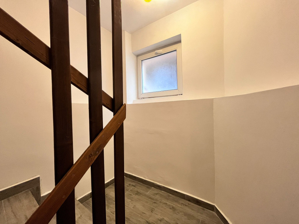 Apartament in vila, pe 2 nivele, cu teren, in Bucium!