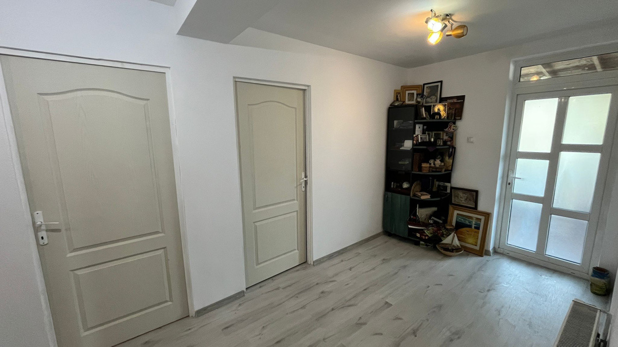 Apartament in vila, pe 2 nivele, cu teren, in Bucium!